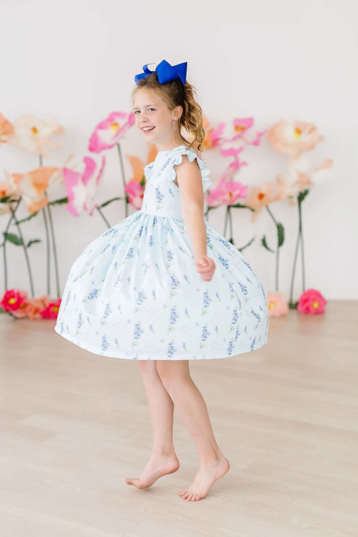 EVIANNA FLUTTER SLEEVE TWIRL DRESS. - TEXAS BLUEBONNETS