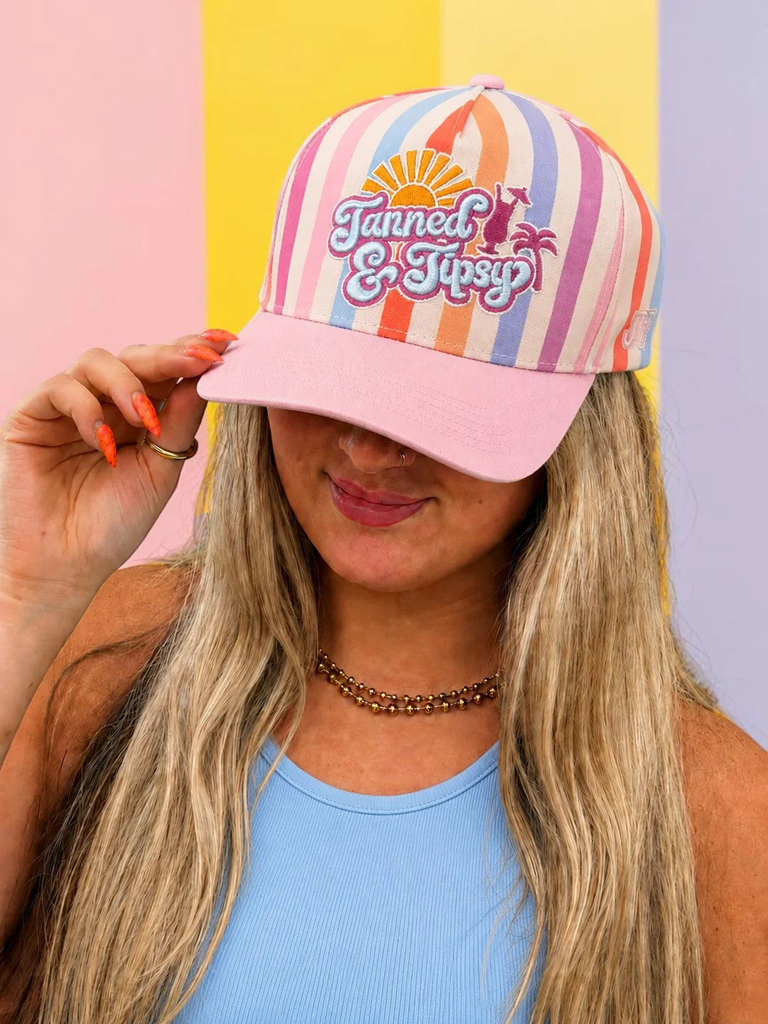 TANNED AND TIPSY TRUCKER HAT