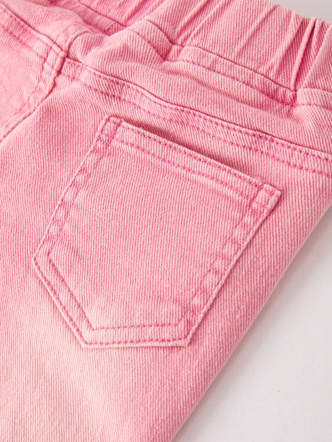 PINK FLARED JEANS