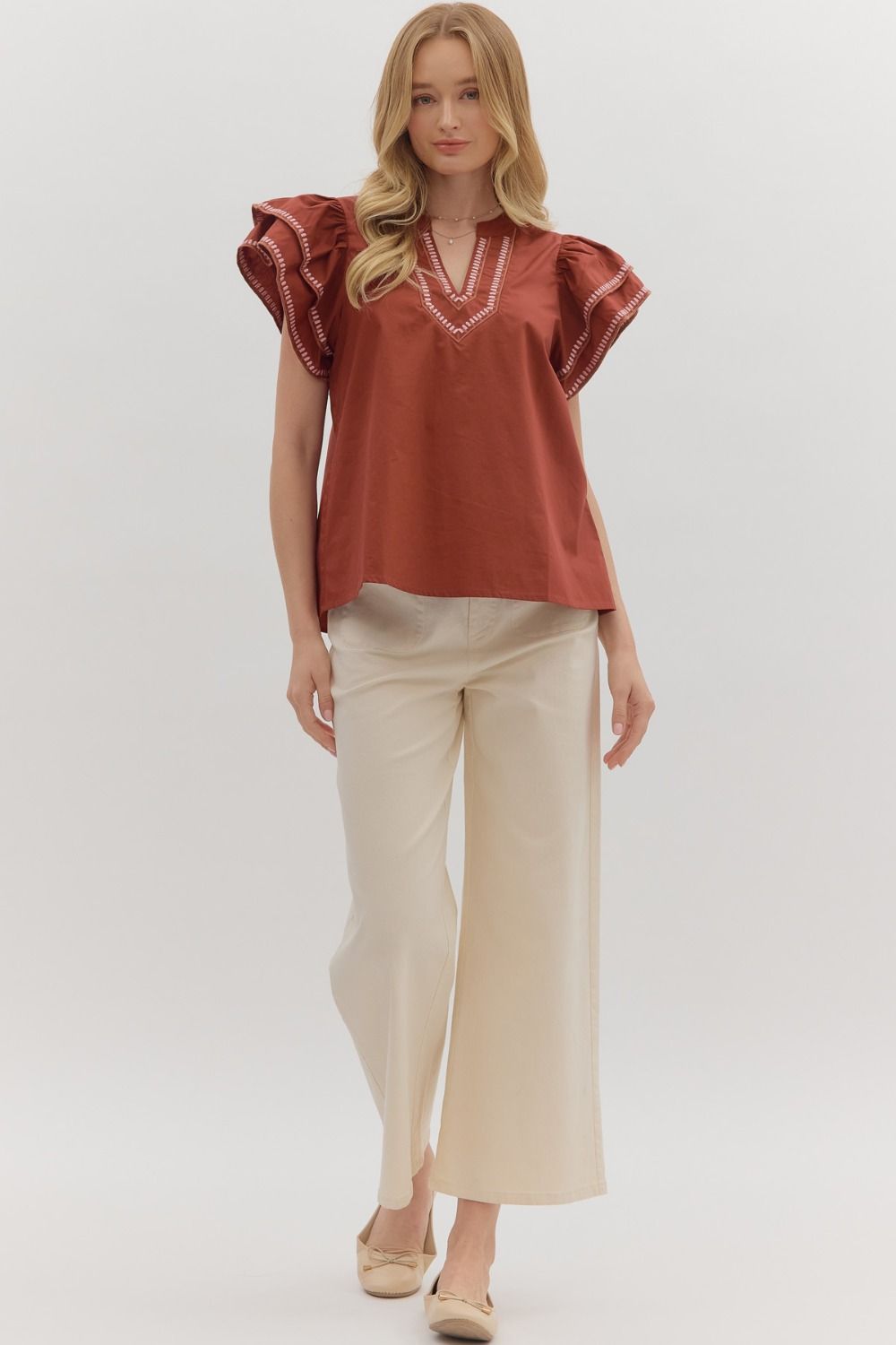 FLIRTY FLUTTER TOP