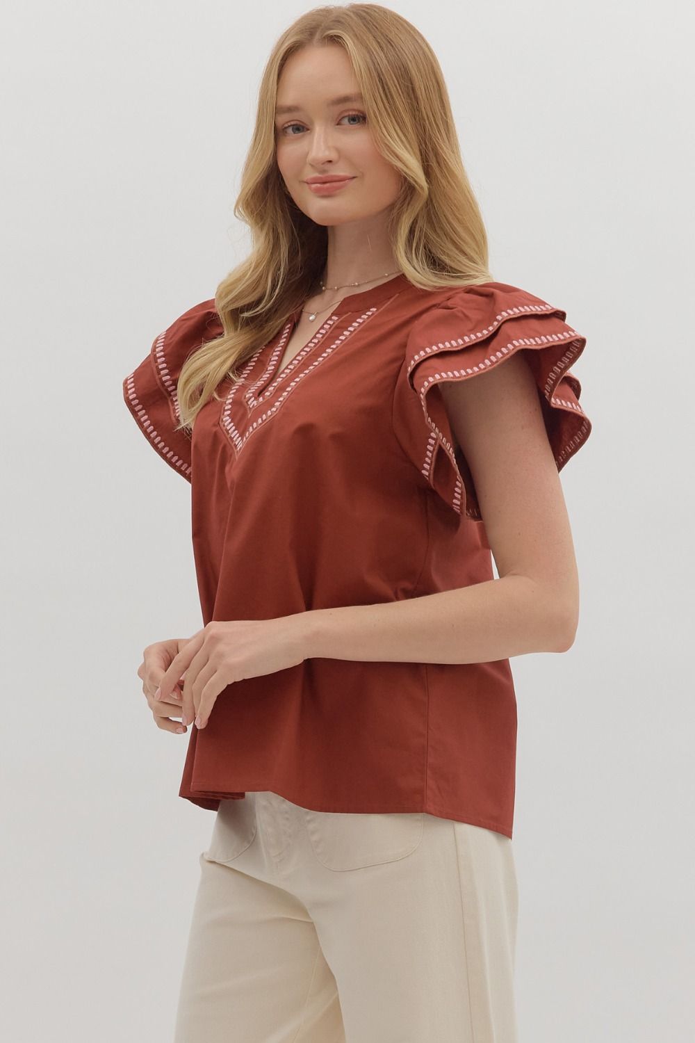 FLIRTY FLUTTER TOP