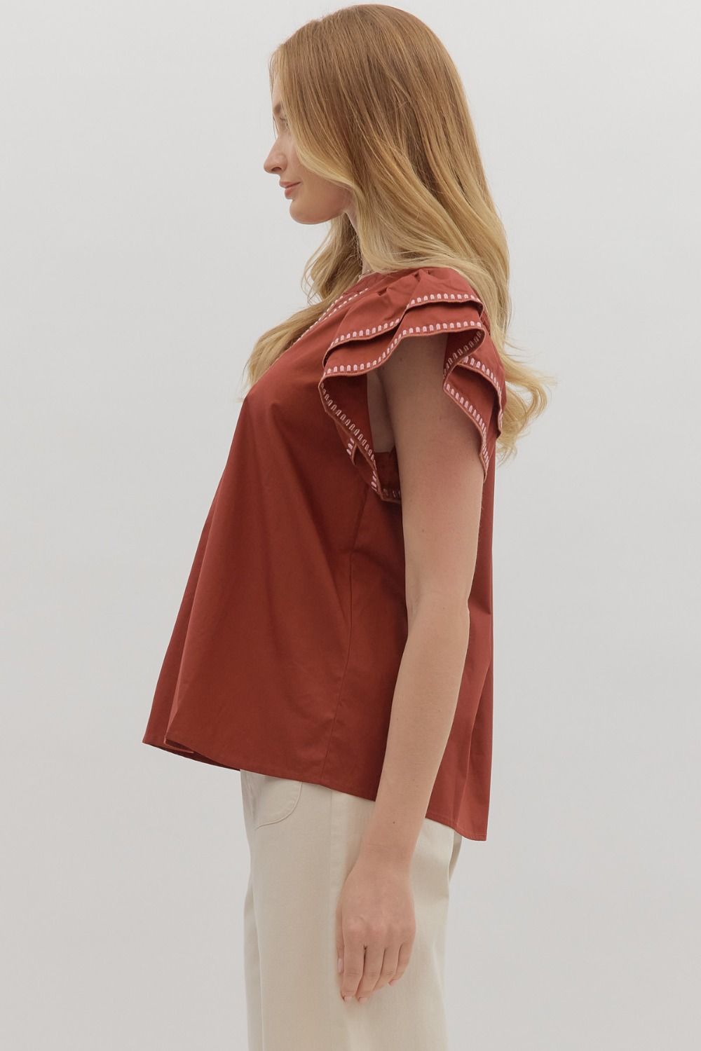 FLIRTY FLUTTER TOP