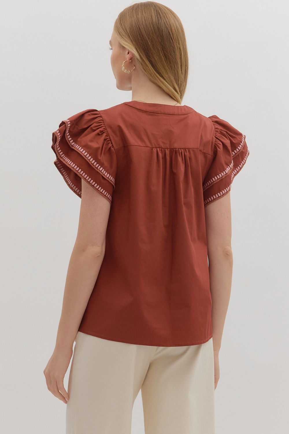 FLIRTY FLUTTER TOP