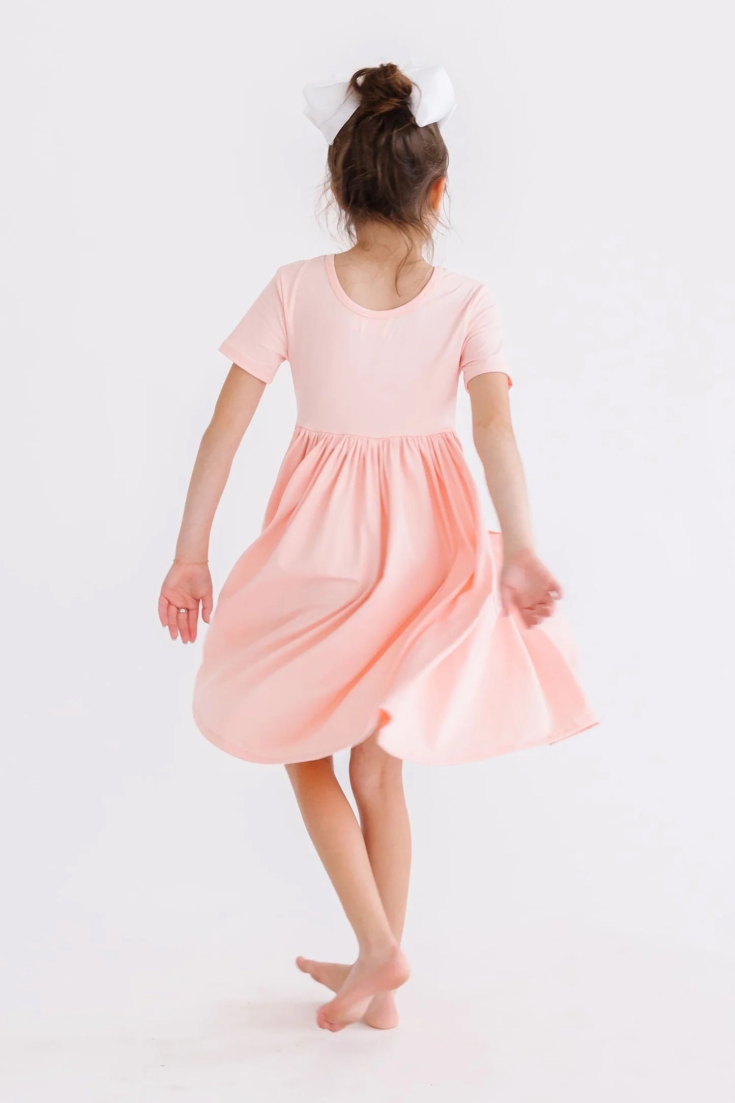 CARLY TWIRL DRESS - PEACH