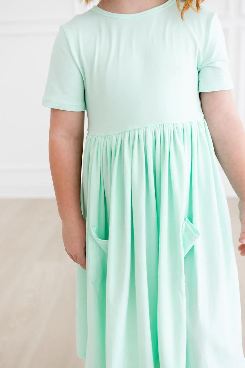CARLY TWIRL DRESS - PASTEL GREEN